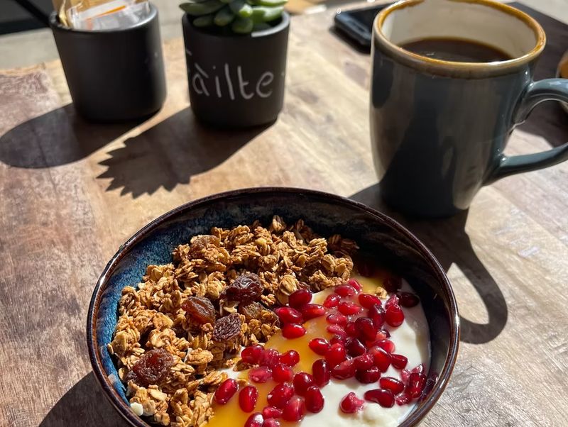 Granola served with fresh fruit and yoghurt